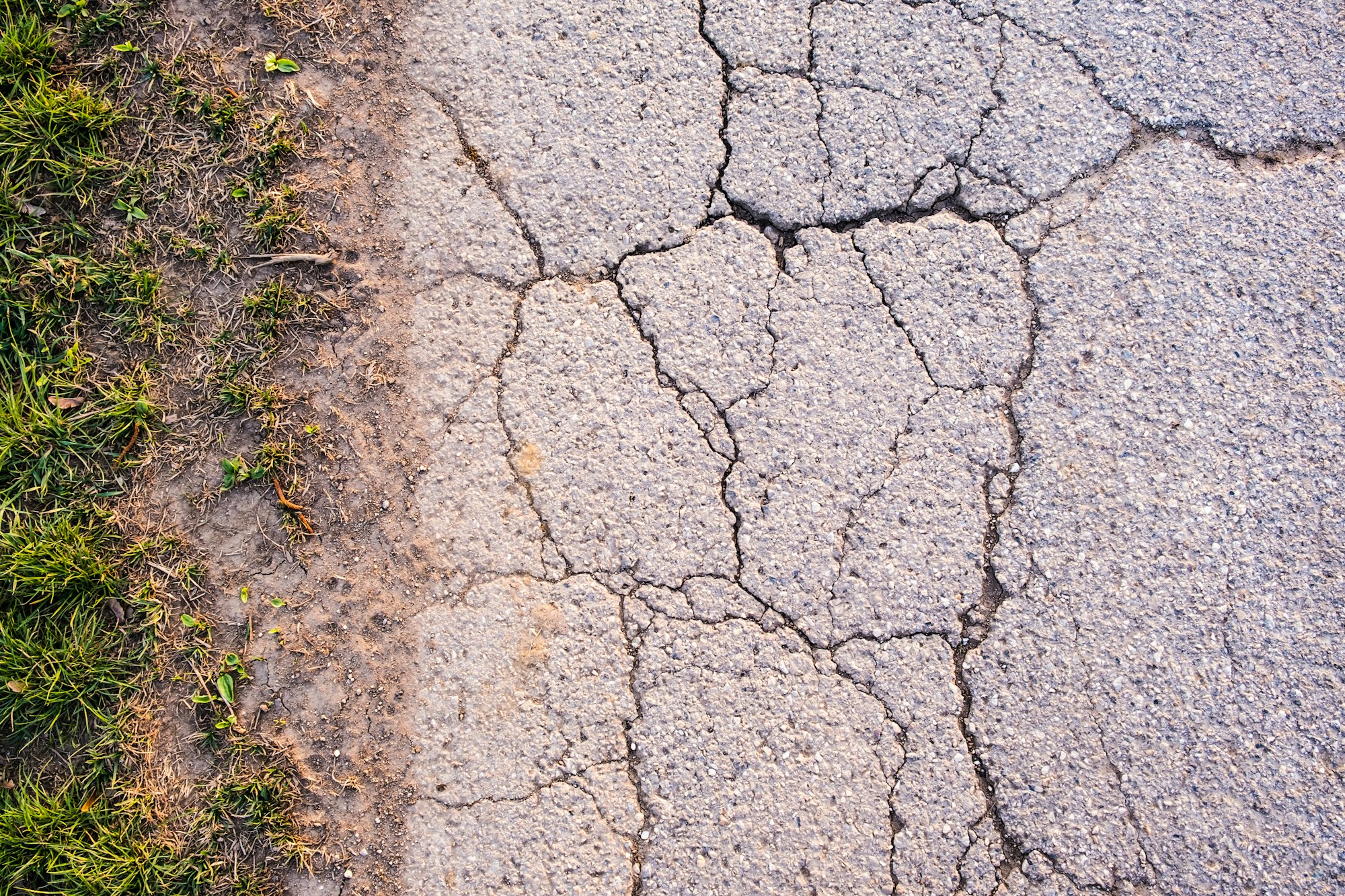 asphalt texture with cracks on rural road